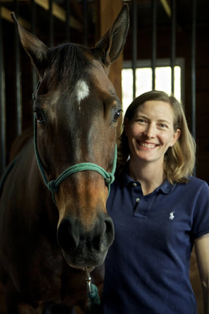 Dr. Means with her horse Uma